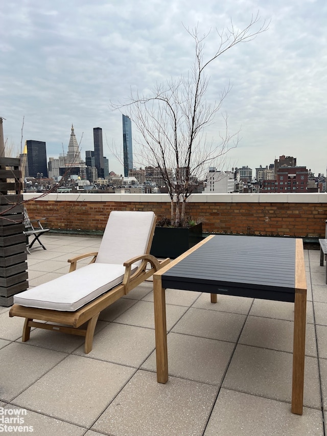 view of patio featuring a skyline view