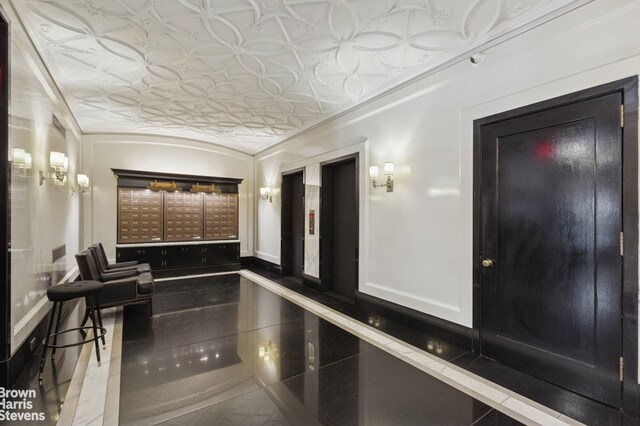 161 W 16th St Unit 12K, New York City, NY 10011 - community lobby with an ornate ceiling and crown molding
