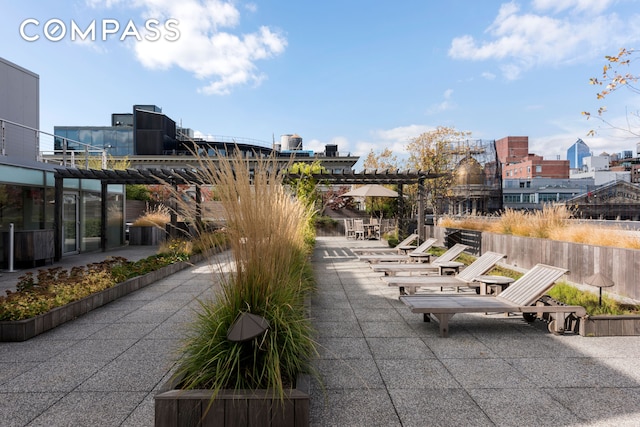 view of home's community featuring a patio area