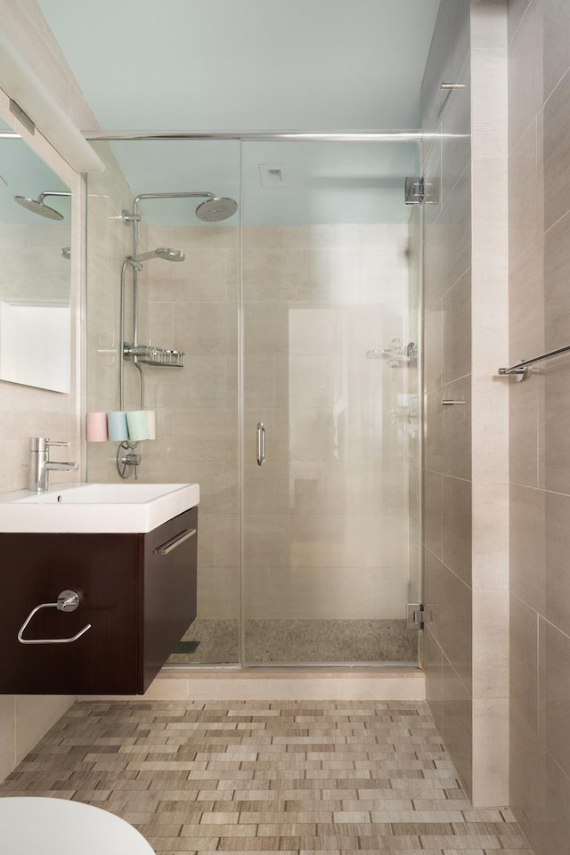 157 W 78th St Unit 6/5S, New York City, NY 10024 - bathroom featuring a stall shower, toilet, and vanity