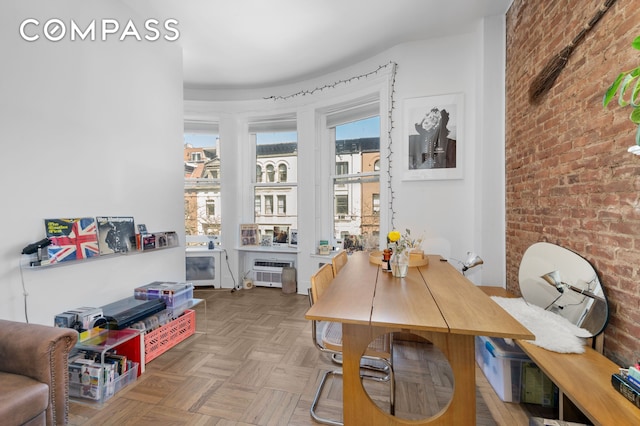 122 W 80th St Unit 3F, New York City, NY 10024 - dining area with brick wall
