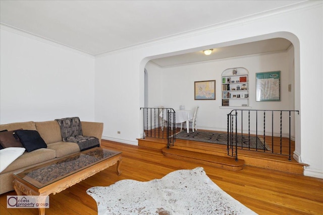45 Park Ter W Unit 6E, New York City, NY 10034 - living area with arched walkways, wood finished floors, ornamental molding, and built in features