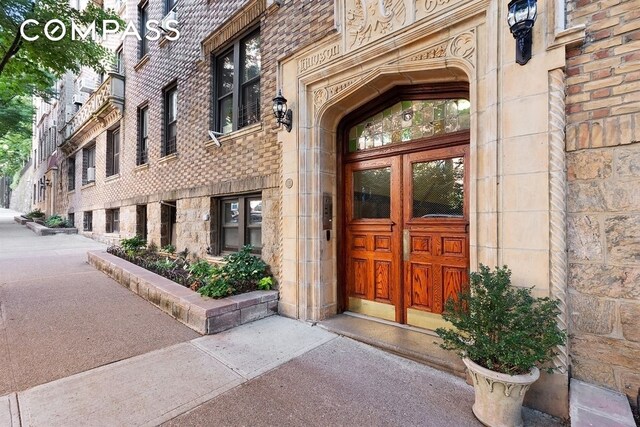 115 Cabrini Blvd Unit B51, New York City, NY 10033 - view of exterior entry featuring stone siding