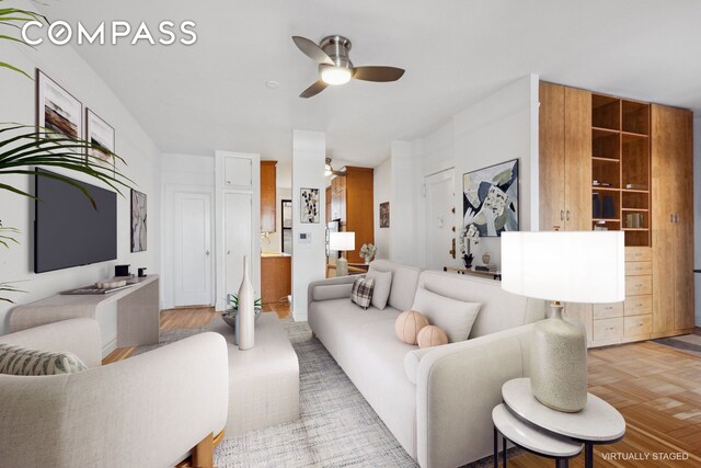 115 Cabrini Blvd Unit B51, New York City, NY 10033 - living room with a ceiling fan and parquet floors