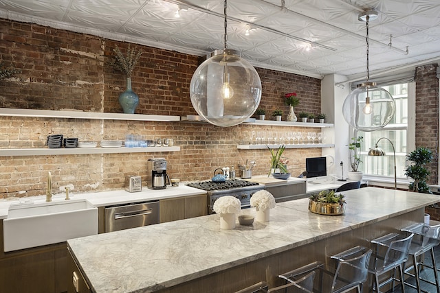 kitchen with a sink, an ornate ceiling, brick wall, and open shelves