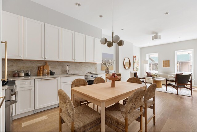 538 Henry St Unit 1, New York City, NY 11231 - dining area featuring light wood finished floors
