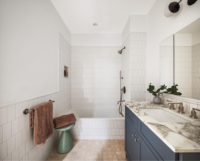 538 Henry St Unit 1, New York City, NY 11231 - bathroom with tile walls, tiled shower / bath combo, and vanity