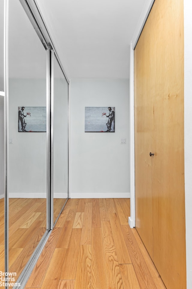 155 E 38th St Unit 16B, New York City, NY 10016 - corridor with light wood-type flooring and baseboards