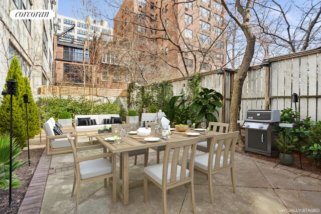 43 Charlton St, New York City, NY 10014 - view of patio / terrace with a grill, fence, outdoor dining space, and outdoor lounge area