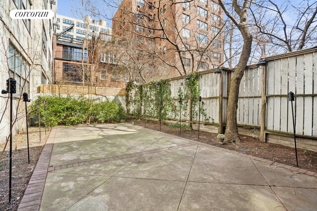 43 Charlton St, New York City, NY 10014 - view of patio with a fenced backyard