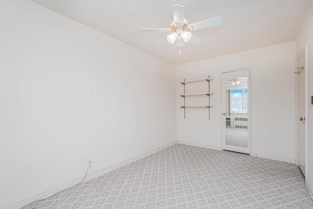 unfurnished room featuring ceiling fan, baseboards, and light colored carpet