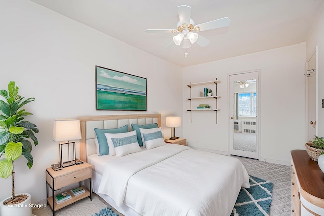 bedroom with baseboards and ceiling fan