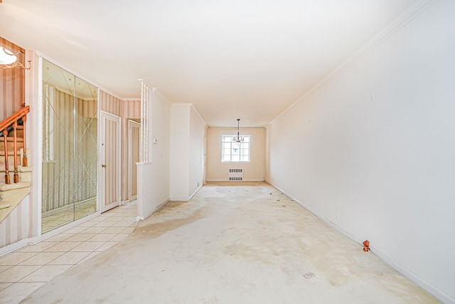 unfurnished room featuring ornamental molding, radiator, a chandelier, and baseboards