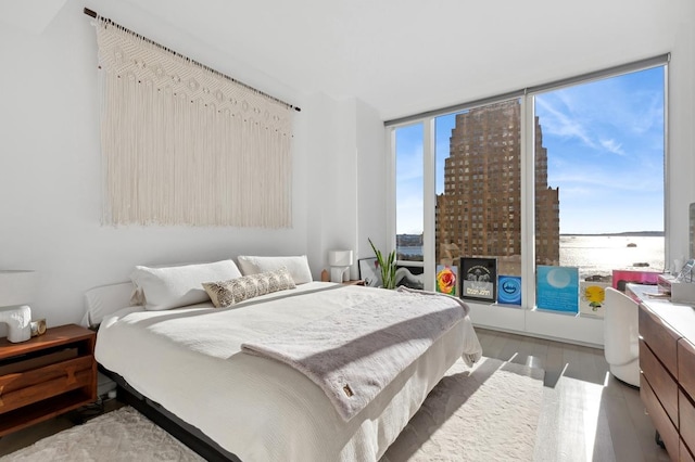 50 W St Unit 17-C, New York City, NY 10006 - bedroom featuring wood finished floors