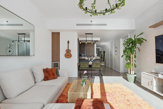living area with brick wall