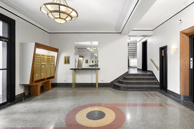 210 W 103rd St Unit 2G, New York City, NY 10025 - community lobby with crown molding and stairs
