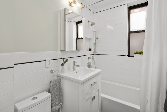 210 W 103rd St Unit 2G, New York City, NY 10025 - full bath with vanity, shower / tub combo with curtain, toilet, and tile walls