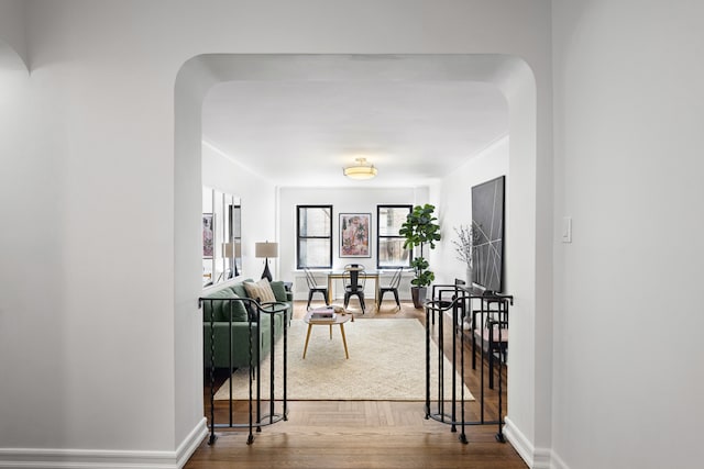 210 W 103rd St Unit 2G, New York City, NY 10025 - hallway featuring arched walkways and baseboards