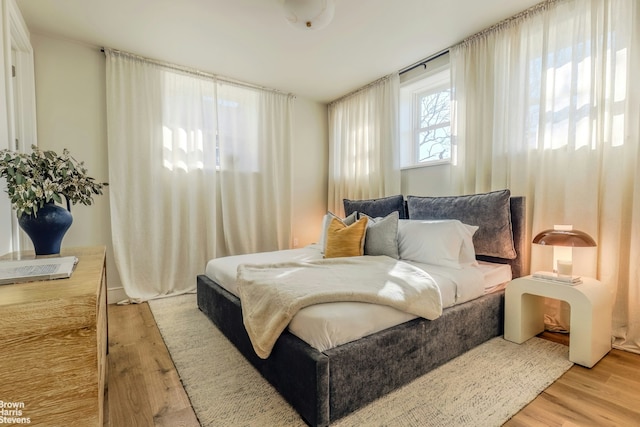 bedroom with light wood-type flooring