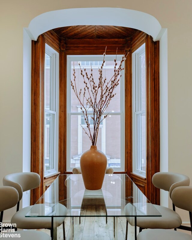 interior space with wood ceiling and arched walkways