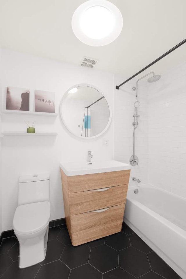 35 E 4th St Unit 3, New York City, NY 11218 - full bath with vanity, bathtub / shower combination, toilet, and tile patterned floors