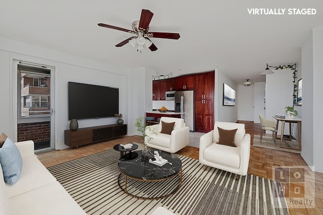 living room with ceiling fan