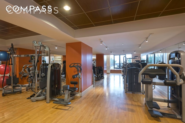 360 Furman St Unit 734, New York City, NY 11201 - exercise room with wood finished floors and rail lighting