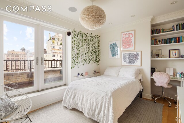 309 W 86th St Ph, Ph, New York City, NY 10024 - bedroom with access to outside, wood finished floors, and ornamental molding