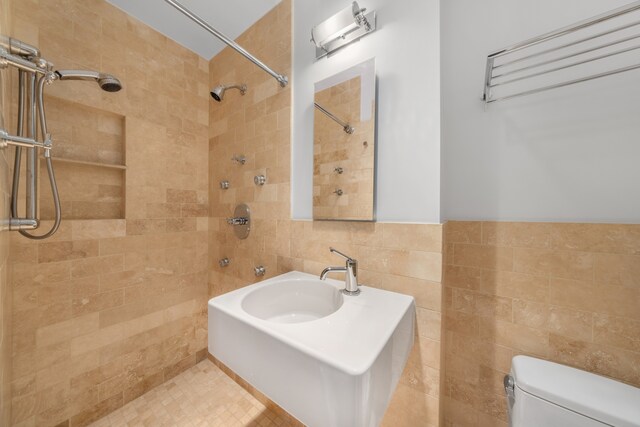 1342 Lexington Ave, New York City, NY 10128 - bathroom featuring tile walls, a tile shower, and toilet