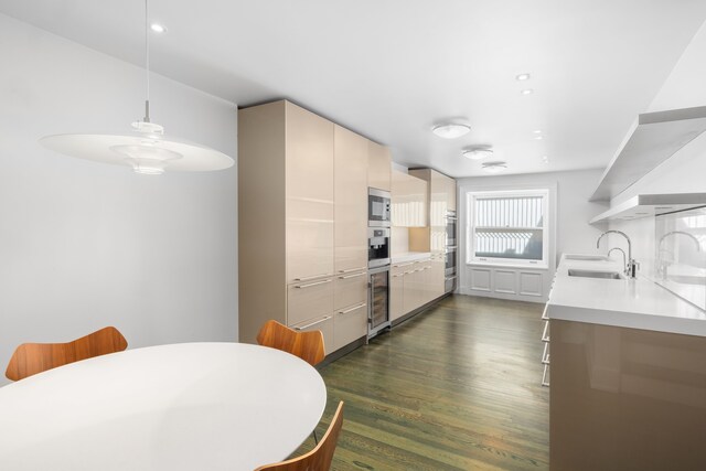 1342 Lexington Ave, New York City, NY 10128 - kitchen with a sink, wine cooler, modern cabinets, stainless steel appliances, and recessed lighting