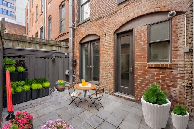 1342 Lexington Ave, New York City, NY 10128 - view of patio featuring fence