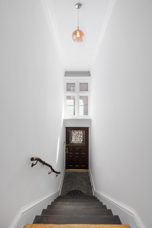 1342 Lexington Ave, New York City, NY 10128 - staircase with crown molding and baseboards