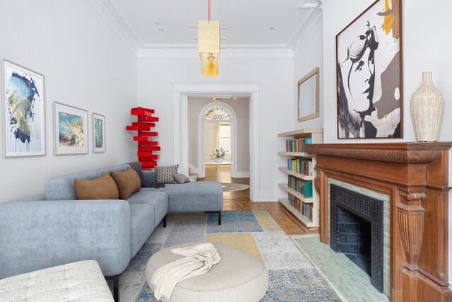 1342 Lexington Ave, New York City, NY 10128 - living area with wood finished floors, ornamental molding, a fireplace with flush hearth, and baseboards