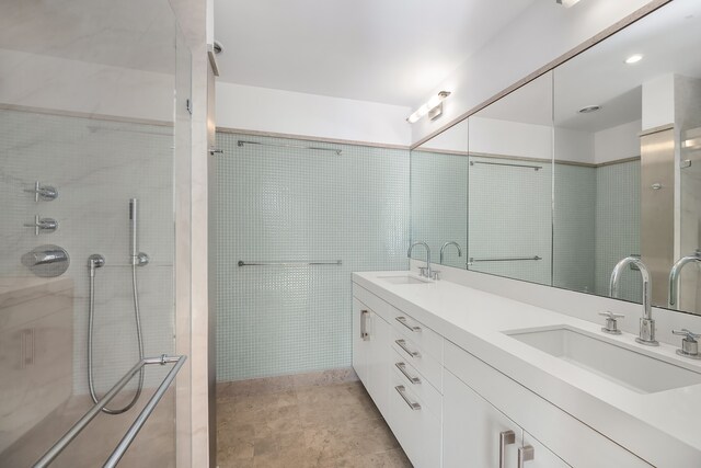 1342 Lexington Ave, New York City, NY 10128 - full bath featuring tiled shower and double vanity