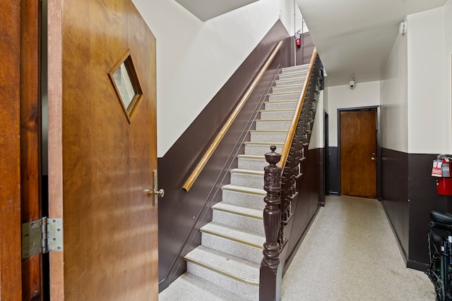30-53 23rd St, New York City, NY 11102 - staircase featuring carpet