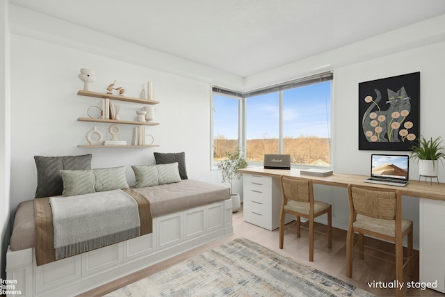 bedroom with built in study area