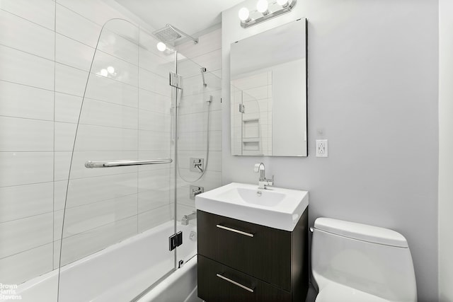10 W 15th St Unit 924, New York City, NY 10011 - full bathroom featuring combined bath / shower with glass door, vanity, and toilet