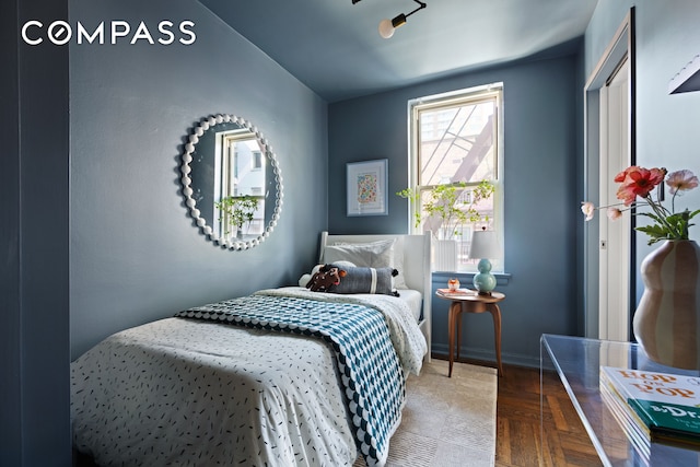13 W 13th St Unit 6Js, New York City, NY 10011 - bedroom with baseboards and vaulted ceiling