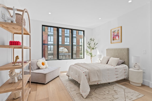 1025 Pacific St Unit 2A, New York City, NY 11238 - bedroom with wood finished floors and recessed lighting