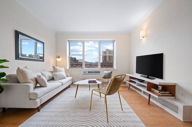 1787 Madison Ave Unit 402, New York City, NY 10035 - living area featuring crown molding and wood finished floors