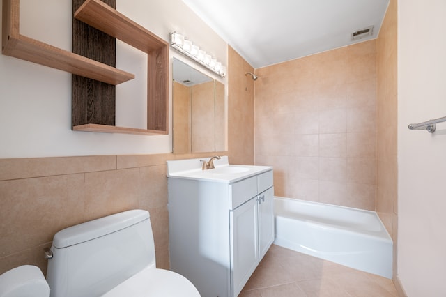 full bathroom featuring tile patterned flooring, visible vents, toilet, vanity, and shower / bath combination