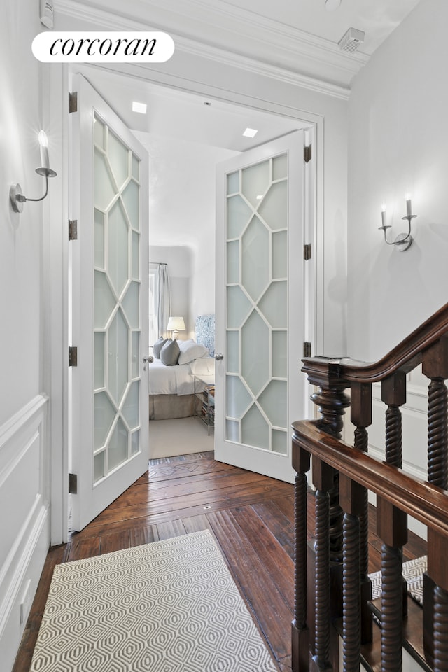 corridor featuring ornamental molding