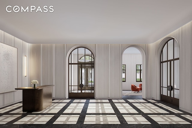 interior space featuring a wealth of natural light and arched walkways