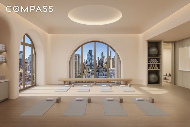 interior space with a view of city and built in shelves