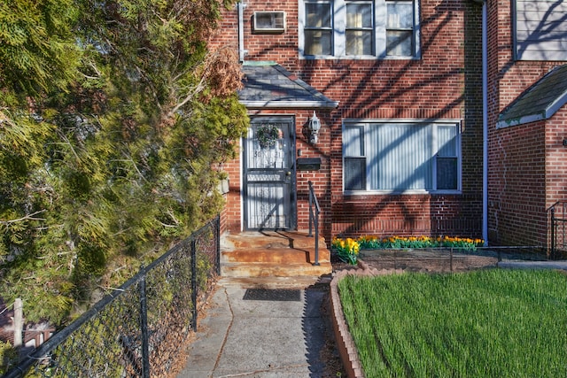 50-21 40th St, New York City, NY 11104 - entrance to property featuring brick siding and fence