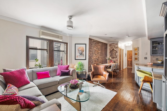 living area featuring crown molding, dark wood finished floors, and a wall mounted air conditioner