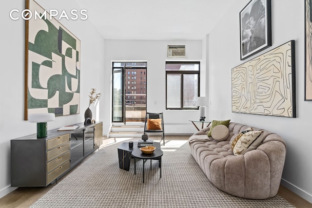 372 5th Ave Unit 9J, New York City, NY 10018 - living room with wood finished floors and baseboards