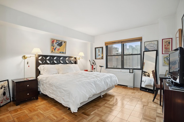 301 E 69th St Unit 15K, New York City, NY 10021 - bedroom featuring radiator