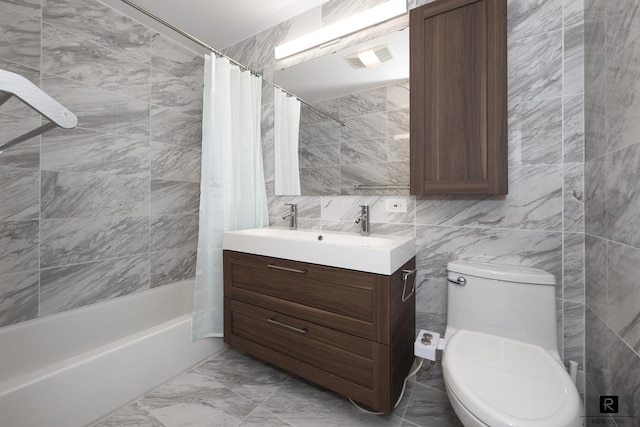 110-12 64th Ave Unit 2-Ab, New York City, NY 11375 - full bath with tile walls, vanity, shower / bathtub combination with curtain, and marble finish flooring