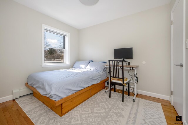 110-12 64th Ave Unit 2-Ab, New York City, NY 11375 - bedroom with wood finished floors and baseboard heating